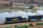 CSXT 6445 LHF on local L20626 heads west past thin ice breaking up following the Christmas weekend deep freeze.